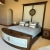 Stunning Designer Cal King Bed Featuring Tall Uphostered Headboard With Round Mirror And Upholstered Footboard With...