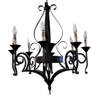 Attributed to Paul Ferrante Scrolled Iron Eight-Arm Chandelier For Sale