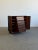 W48 D18.25 H44.5 Striking mid-century modern cabinet in richly grained rosewood, fully refinished to highlight the...