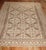 early 20th Kurd rug in ivory, brown and peach tones with a keyhole design you sometimes find in smaller tribal caucasian...