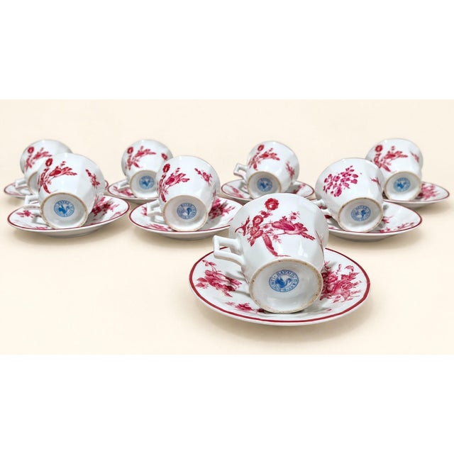 An elegant Limoges fine porcelain coffee service, signed Raynaud & Co., comprising eight cups and matching saucers. The...