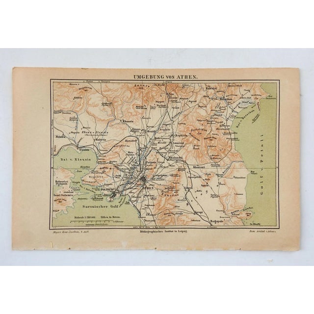 Small circa 1900 map of Athens Greece book plate. Published in Germany. Unframed, age toning, edge wear.