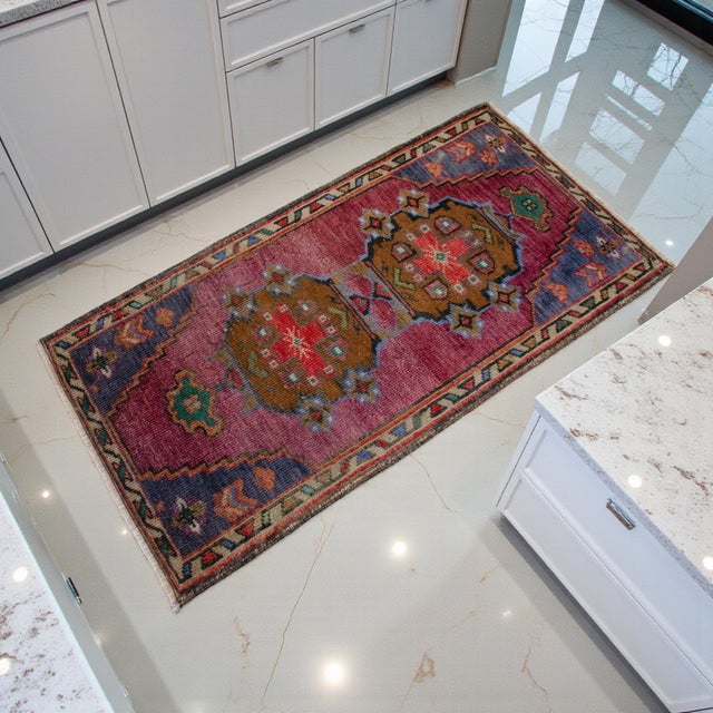 Vintage Turkish Hand-Knotted Small Rug from Oushak, 1970s. Authentic rosewood pink mini rug featuring timeless Anatolian...