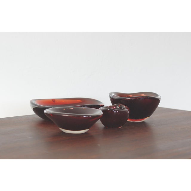 The “Selena” glass bowl is an exceptional example of Scandinavian functional glass artistry, designed by Sven Palmqvist...