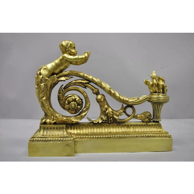 Antique French Louis XV Style Bronze Cherub Chenets Fireplace Andirons - Pair. Item features finely cast bronze details,...