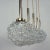This Space Age pendant lamp was designed and manufactured in Germany in the 1960s. It is made of clear bubble glass and...
