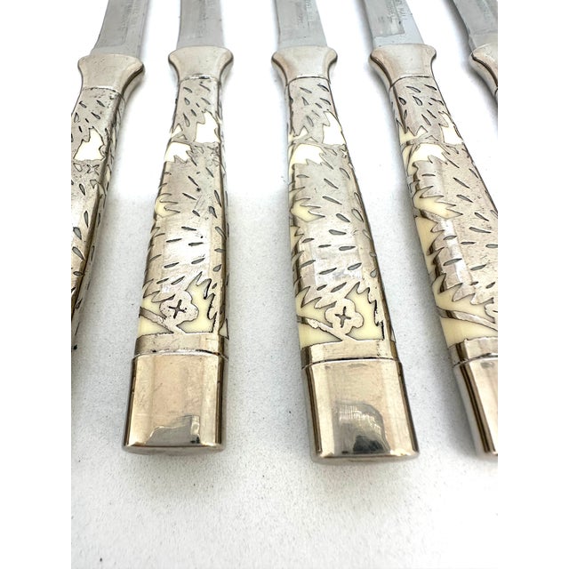 Gorgeous set of six fruit knives from Briddell by Carvel Hall engraved with manufacturers name.. beautiful details of...