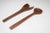 Mid-Century Modern Teakwood Salad Tongs featuring a deeply sculpted fork with exaggerated gap for easier grasp and spoon...