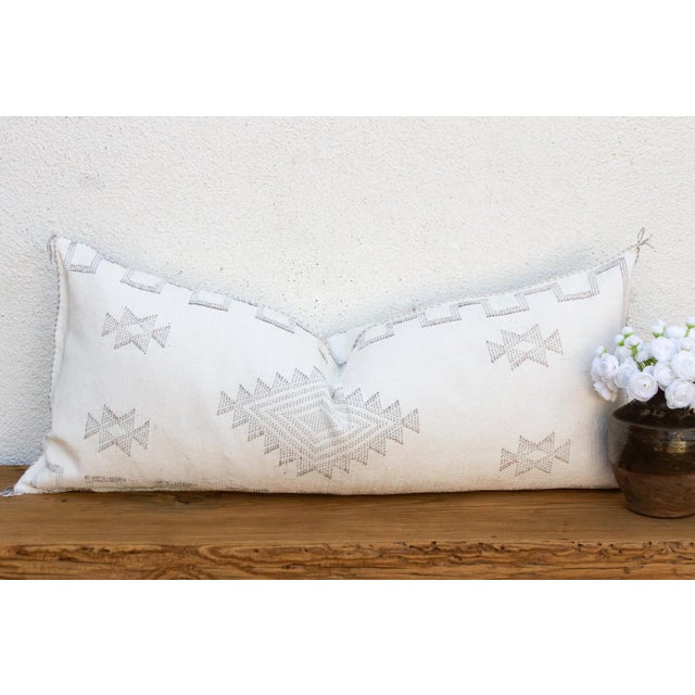 Woven from the resilient fibers of the Saharan aloe vera cactus — often called cactus silk or Sabra silk — this generously...