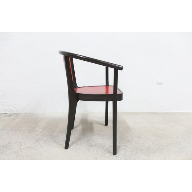 Set of 6 Baumann designer designer models by Pagnon and Pelhaitre. They are wenge and red in color revealing wood ribs....