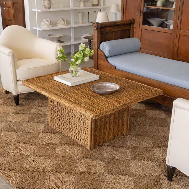 Beautiful rectangular wicker coffee table from France, 1960s. Solid wicker throughout with wicker block base. Original...