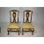 A stunning pair of elegant french hand-carved and heavily ornamented chairs. Finely handcrafted, clawfoot, giltwood and...