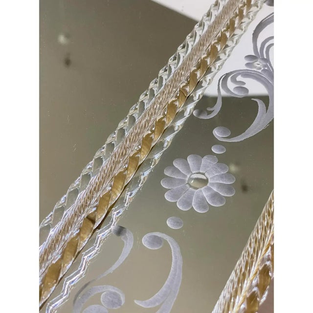 Important mirror with Murano glass transparent elements and green flowers. Rectangular mirror with venetian hand-carved...