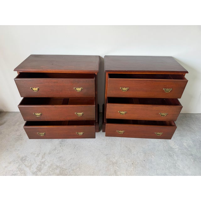Handsome pair of vintage Danersk Chippendale-style chests crafted in rich mahogany with clean, timeless lines and elegant...