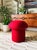 A handmade mushroom shaped ottoman, upholstered in "Goji" red wool fabric. Perfect for using as a footstool or extra...