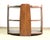 Art Deco petite round oak table, only two feet wide and high. Three shelves with four gently curved waterfall style...
