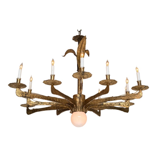 Spanish 1950’s Gilt Iron Twelve-Arm Chandelier With Opaline Glass Center Light For Sale
