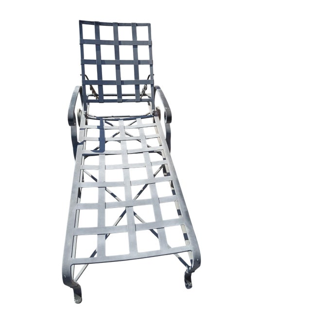 Elevate your outdoor living space with a pair of iconic Brown Jordan Florentine Lounge Chairs. Timeless Design: Part of...