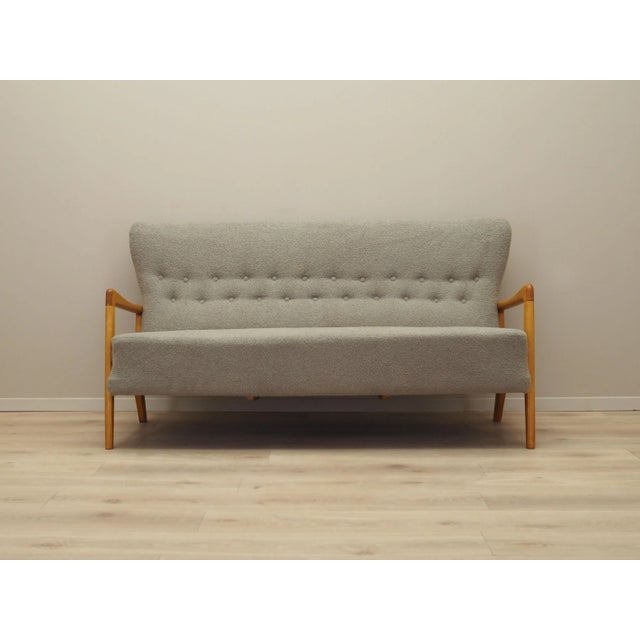 The sofa was made in 1964, designed by Soren Hansen for the well-known Danish manufactory Fritz Hansen. A popular model...