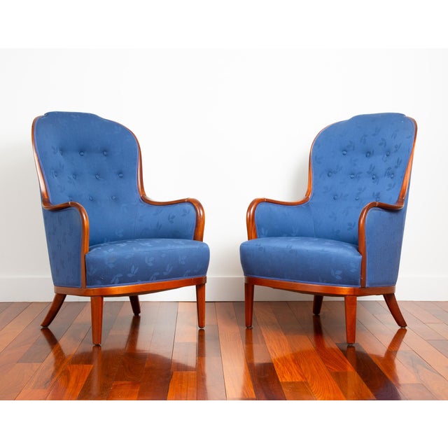 A stunning pair of lounge chairs by renowned Swedish designer Carl Malmsten for OH Sjogren. The model is called Advokaten...