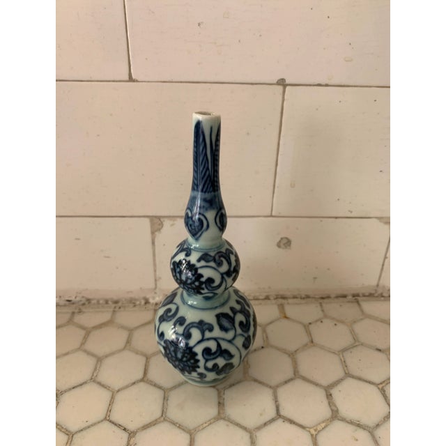 Small Blue & White Porcelain Chinoiserie Vase. Artist stamp underneath.