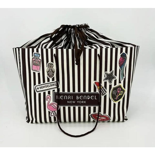 Henri Bendel Cream West 57th Floral Applique Tote in MINT condition. cream leather exterior trimmed with gold hardware and...