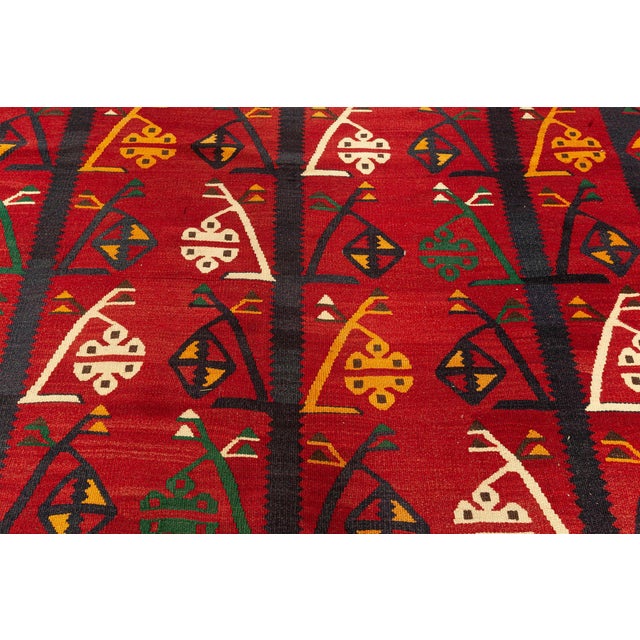 Vintage Afghan Kilim Rug Size: 9'10" × 12'8" (299 × 386 cm). This striking vintage Afghan Kilim from the 1940s is a...