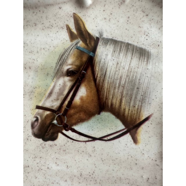 Beautiful decorative porcelain tray featuring two finely detailed horse portraits against a softly speckled cream ground....