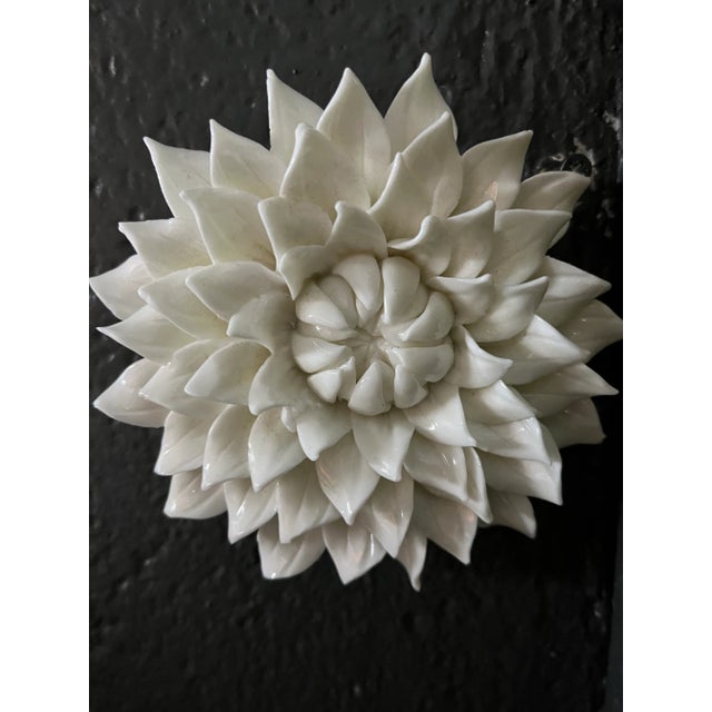 MCM art glass floral that absolutely catches your attention with its stunning detail. Hangs from small metal loop affixed...