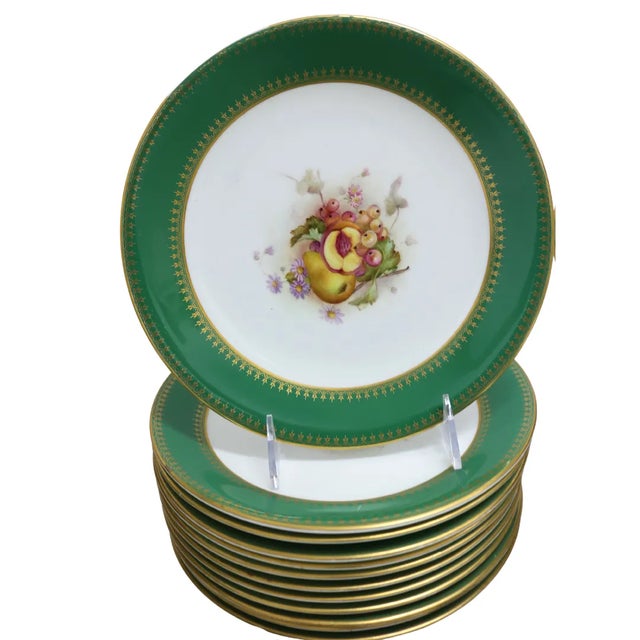 Lush, opulent, and unmistakably English. This magnificent Royal Worcester dessert service, circa 1910–1930, features hand-...