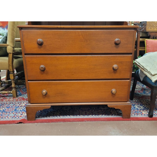 Vintage 1940s-60s Shaker style cherry cupboard. Features two piece construction, hammered iron hinges, wood peg...