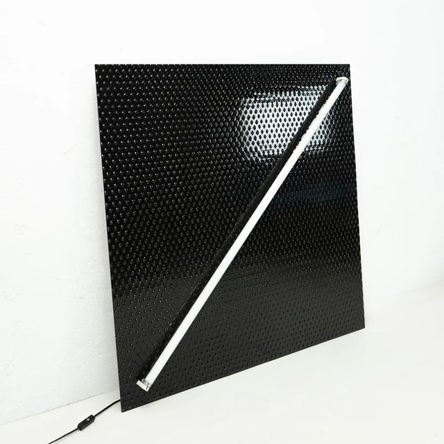 Post-modern wall lamp by award winning Italian architect Sergio Asti, who is well known for his works such as the fibre...