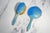 An exquisite example of English Art Deco luxury, this powder blue guilloché enamel sterling silver vanity set is a...