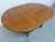 This listing is for a Mid-Century Danish Modern Teak Dining Table. Featuring a 48” round top, hidden pop-up leaves that...
