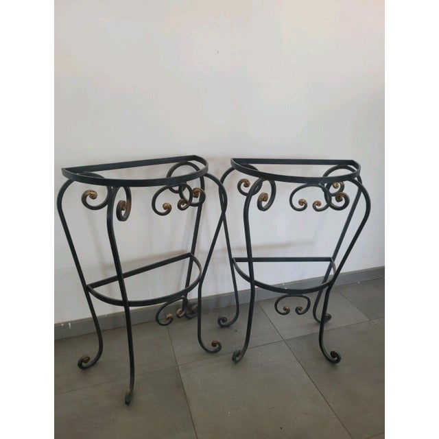 Pair of wrought iron console bases. Excellent overall condition. Period: Second half of the 20th century Dimensions:...
