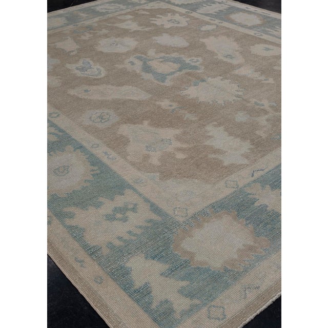 Turkish Oushak Rug Taupe, Blue & Ivory Handwoven Wool Rug 8' X 9'8" This 8' x 9'8" Turkish Oushak area rug is a handwoven...
