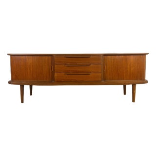 Vintage Teak Sideboard with Rounded Edges and Retracting Doors For Sale