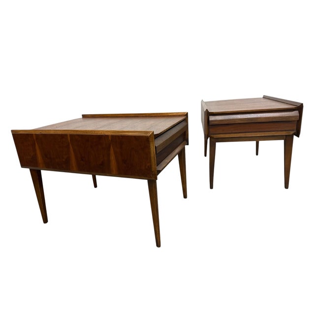 Elevate your space with this stunning pair of Mid-Century Modern Lane 1st Edition walnut side tables. Crafted in the...