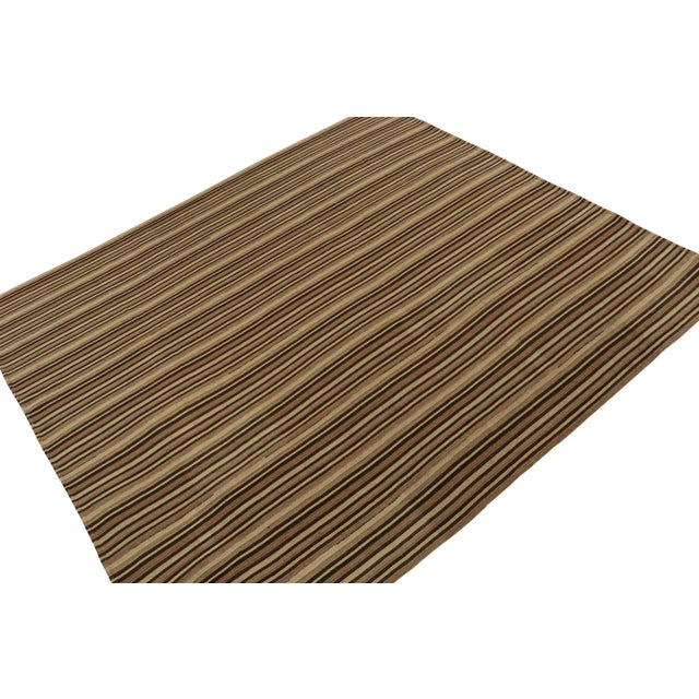 This vintage 9x10 Persian Kilim is a new addition of Bidjar provenance in Rug & Kilim's rare tribal curations. Handwoven...