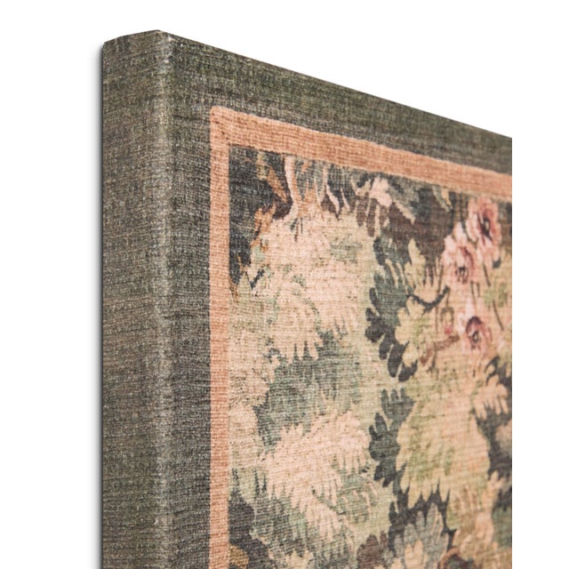 Enchanted Wood wall art is a large tapestry with an antique-inspired forest pattern in soft green and natural brown tones;...