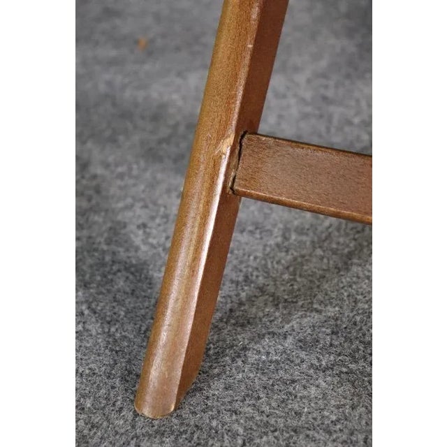 Stunning and strikingly designed mid-century modern butler chair by esteemed designers Ico Parisi and Luisa Parisi for...