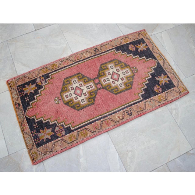 Vintage rosy brown (desaturated pink) color background yastik rug perfect for a small guest bath or in front of the...