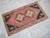 Vintage rosy brown (desaturated pink) color background yastik rug perfect for a small guest bath or in front of the...