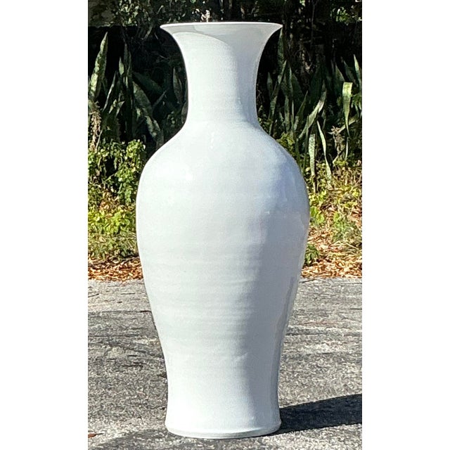 Make a bold statement with this vintage monumental glazed ceramic vase. Featuring an exquisite glossy finish and striking...