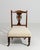 A supremely elegant example of Victorian craftsmanship, this antique nursing chair from the United Kingdom showcases the...