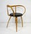 A very well-crafted sculptural bentwood Pretzel chair with dark brown upholstered leather seat cushion. This unique and...