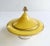 Unique and charming yellow stained glass pedestal dish with gold details.