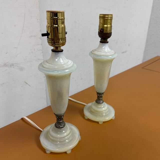 Design Plus Gallery presents a Pair of Vintage Opal Iridescent Glass Table Lamps by Unknown Brand. These lamps are...