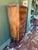 This antique Italian chest features six drawers with intricate floral marquetry, carved accents, brass detailing, and a...