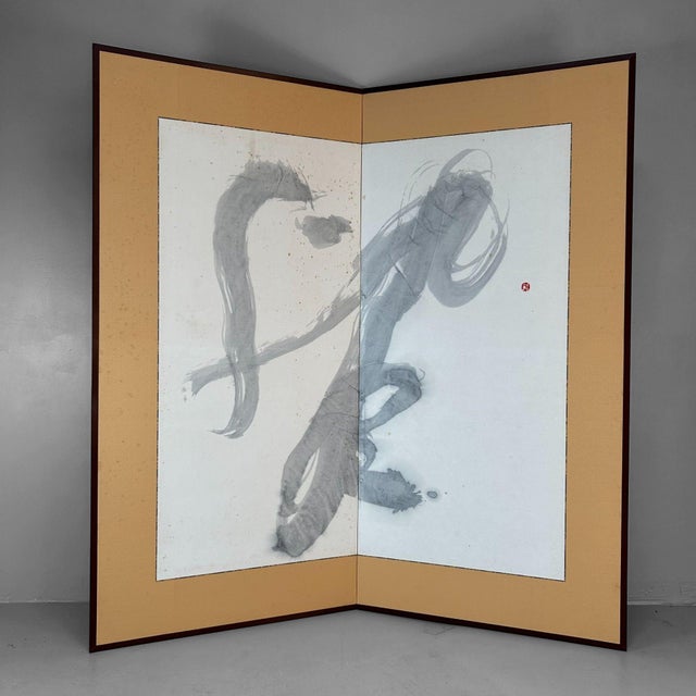 Striking Japanese folding screen (Byōbu, 屏風) with expressive Zen calligraphy in sumi ink. A remarkable Japanese folding...